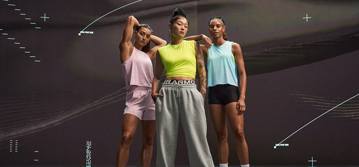  Three women in athleisure wear posing for a picture 