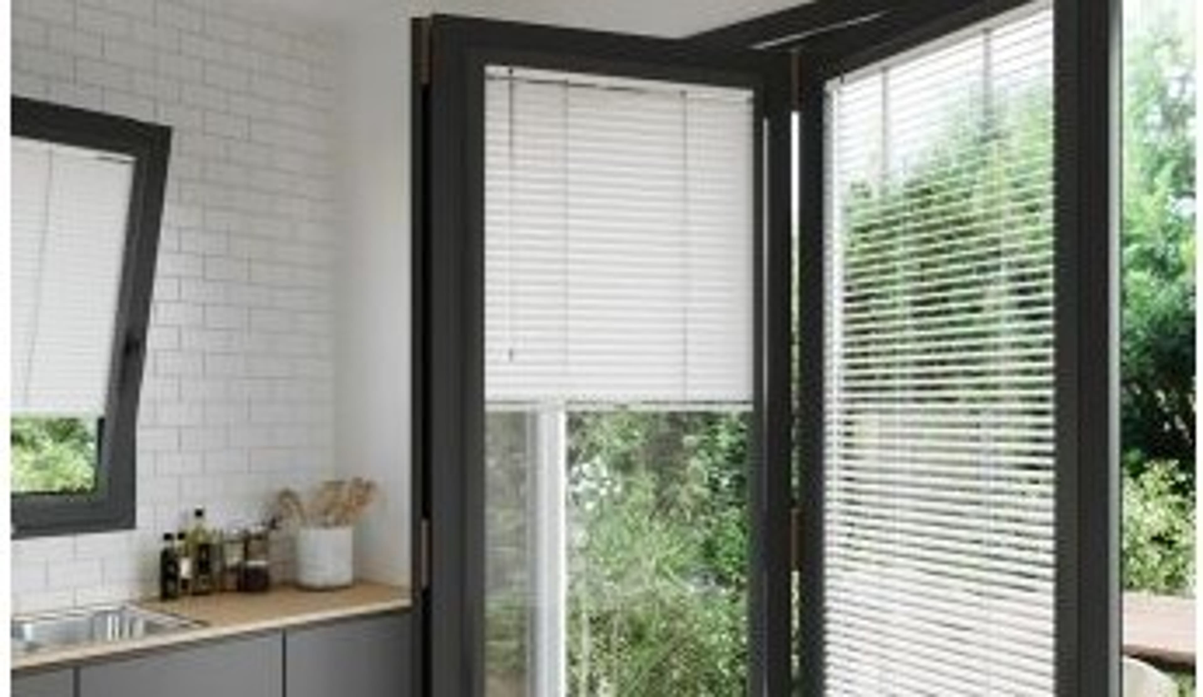  Snow White Gloss Perfect Fit Blinds on a bi-fold patio door 