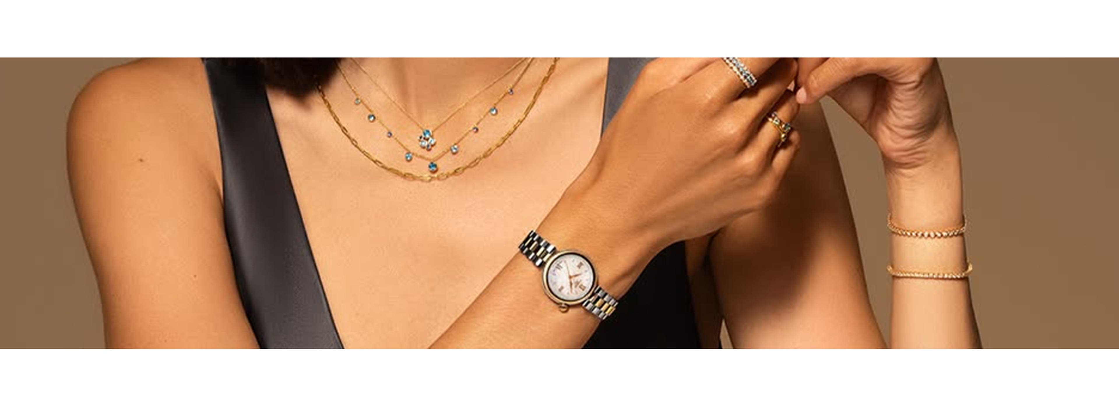 woman posing with jewellery and a watch