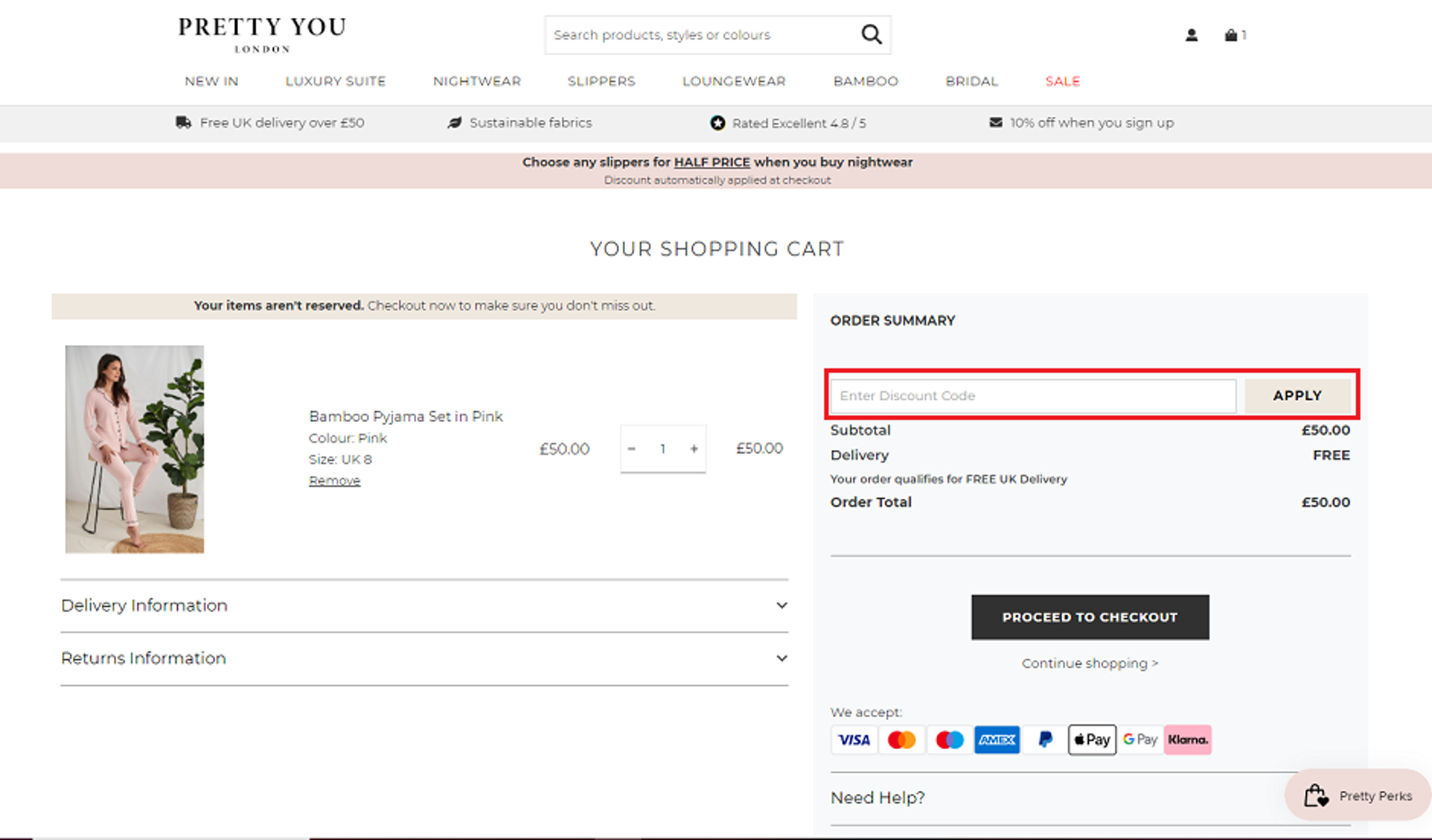  A screenshot of the Pretty You London website showing users how to enter their discount code with the 'Enter Discount Code' box and 'Apply' button highlighted. 