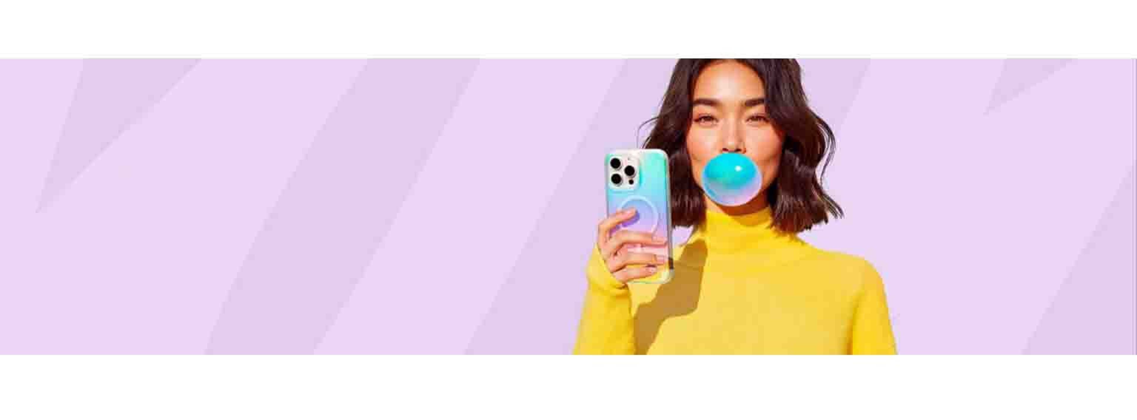 woman blowing gum while holding phone