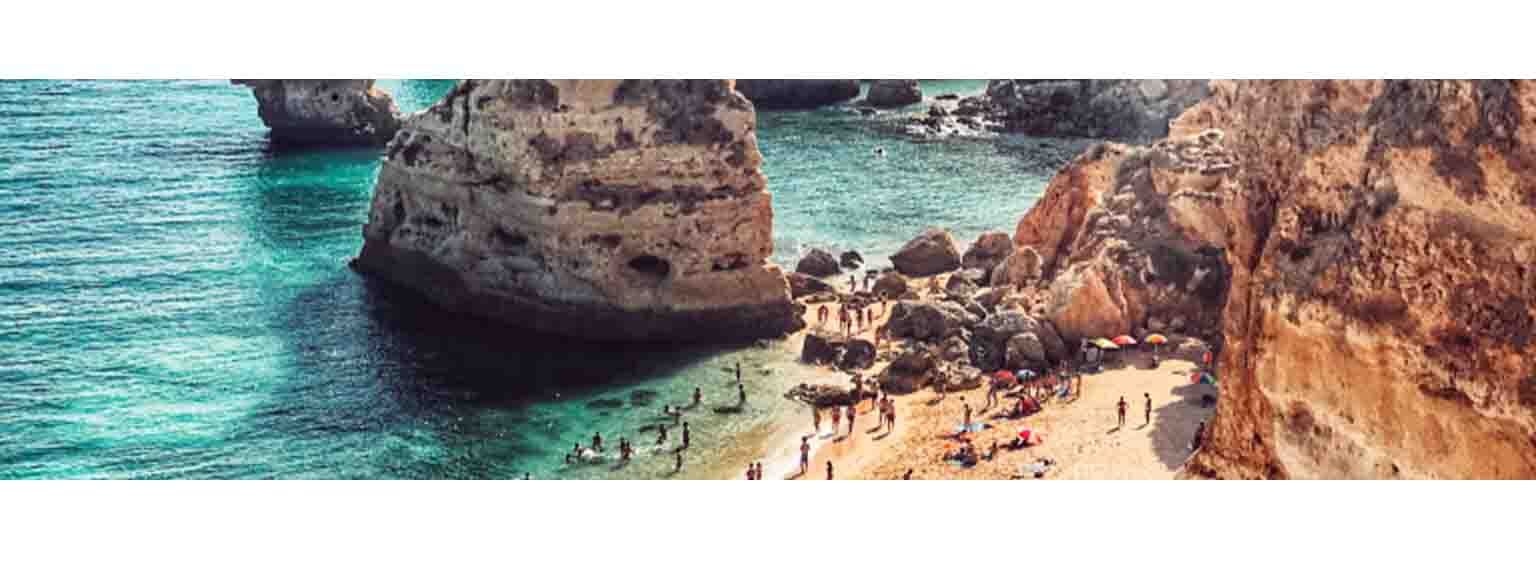  People on the beach in Algarve, Portugal 