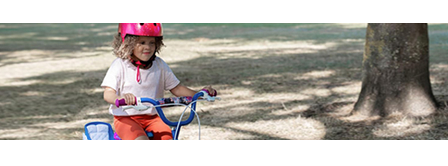  young girl riding bike 