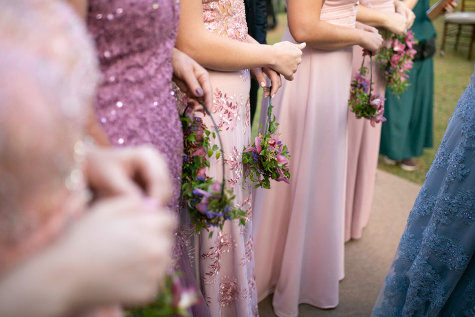  several people in dresses at a wedding 