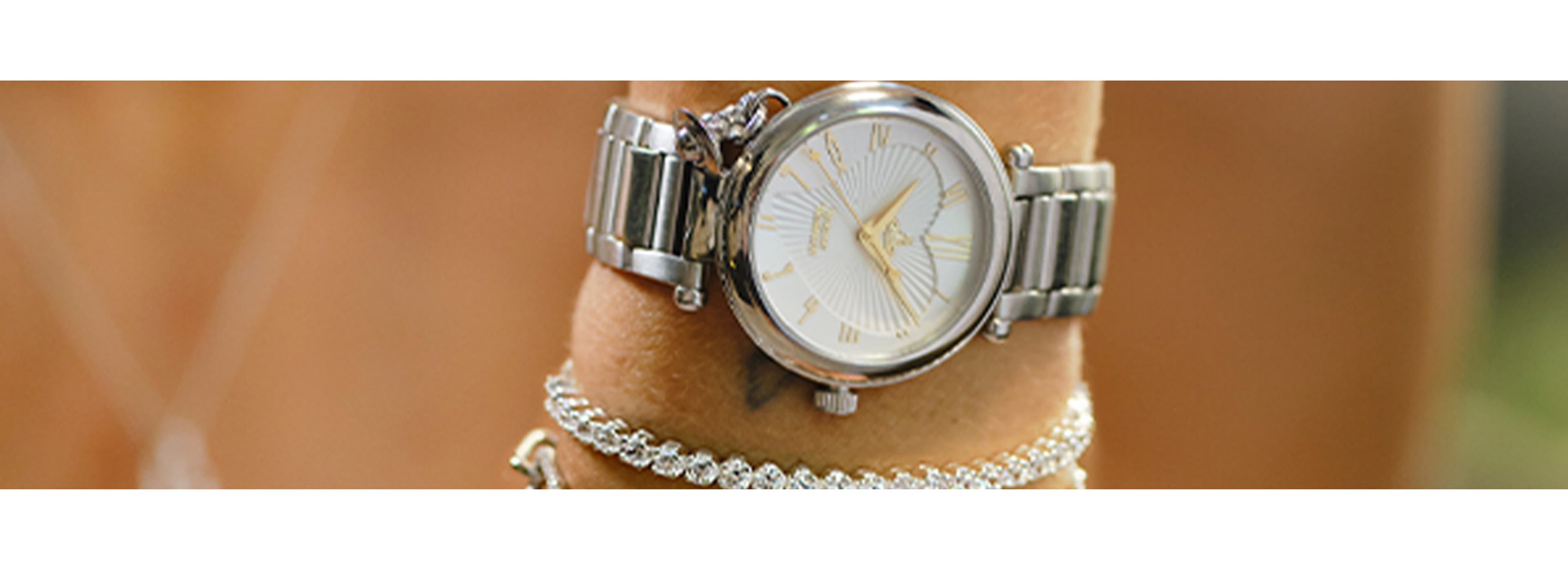 close up of a watch on a wrist