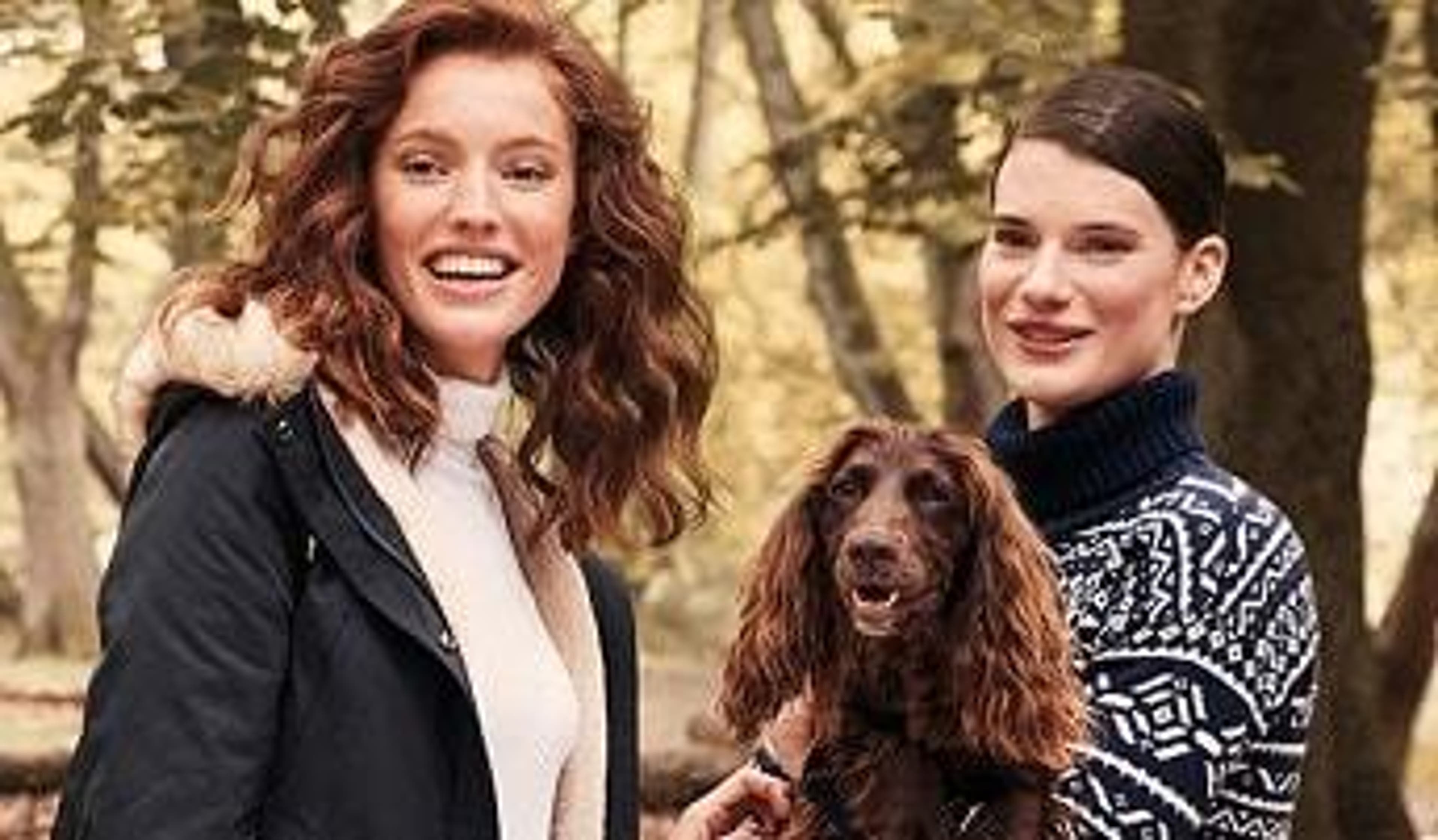  Two women wearing Hobbs clothing out with their dog 