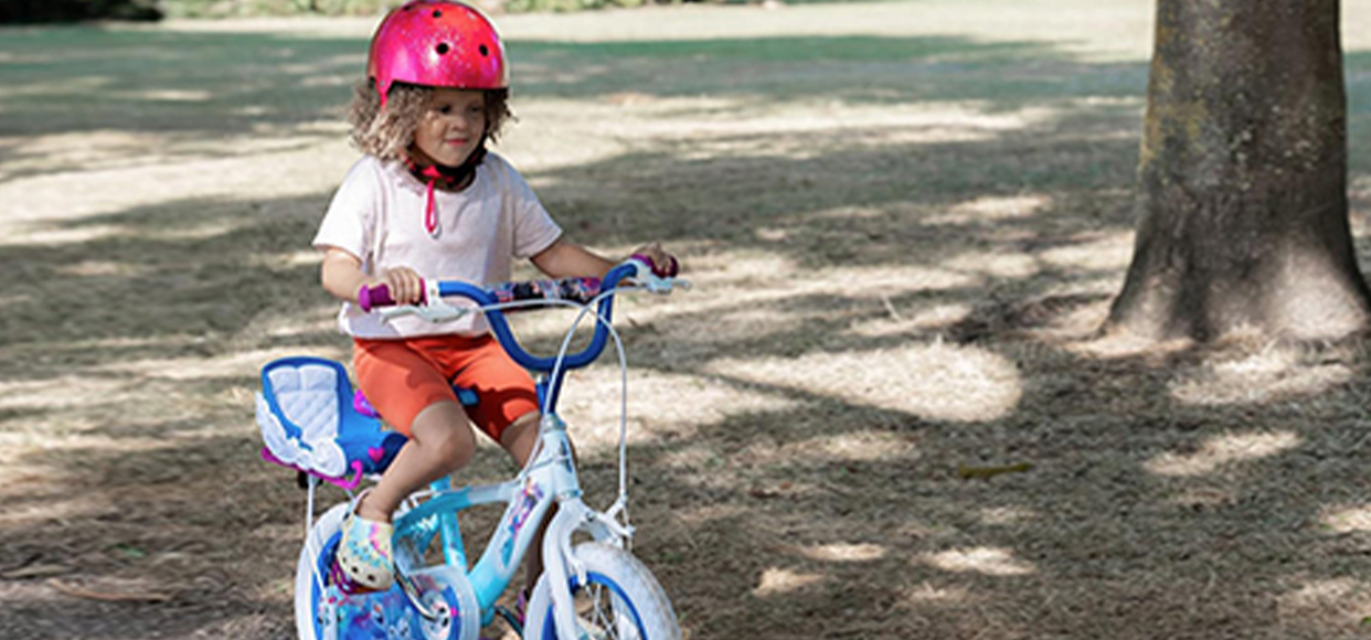  young girl riding bike 