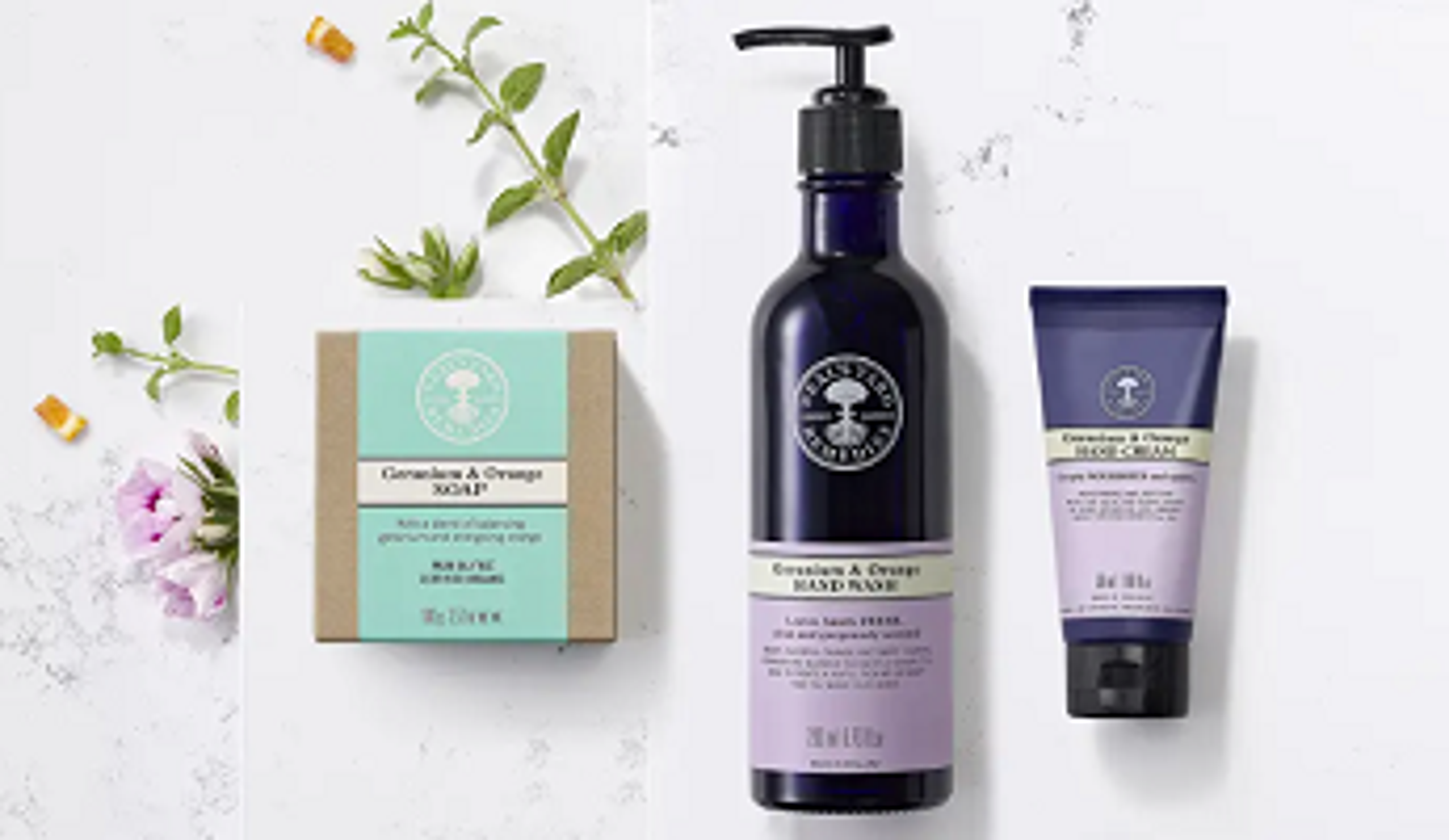  Selection of Hand Washes and Soaps from Neal's Yard Remedies with flowers 