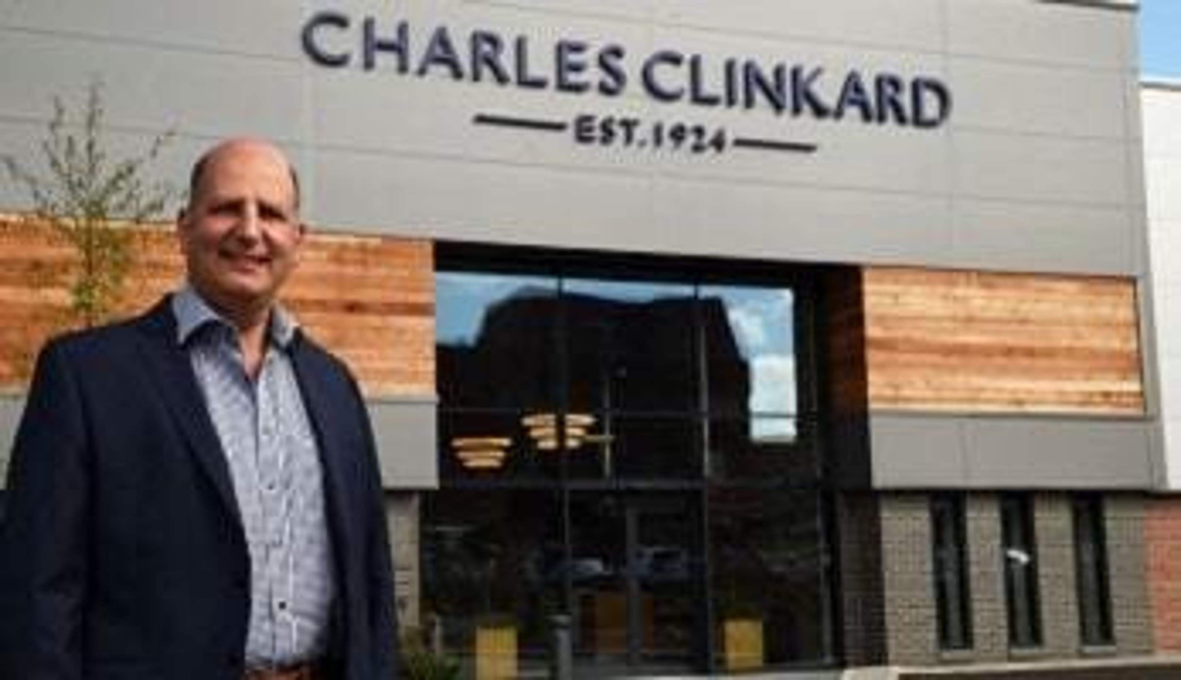  Charles Clinkard director, Charles Clinkard, outside a Charles Clinkard store 