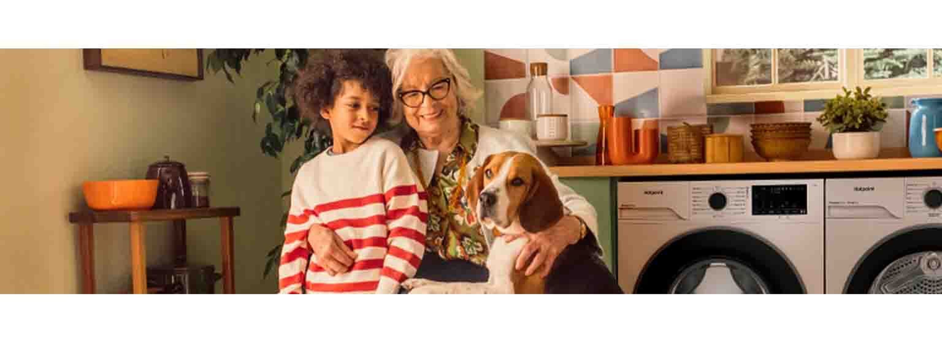 elderly woman with young boy and beagle