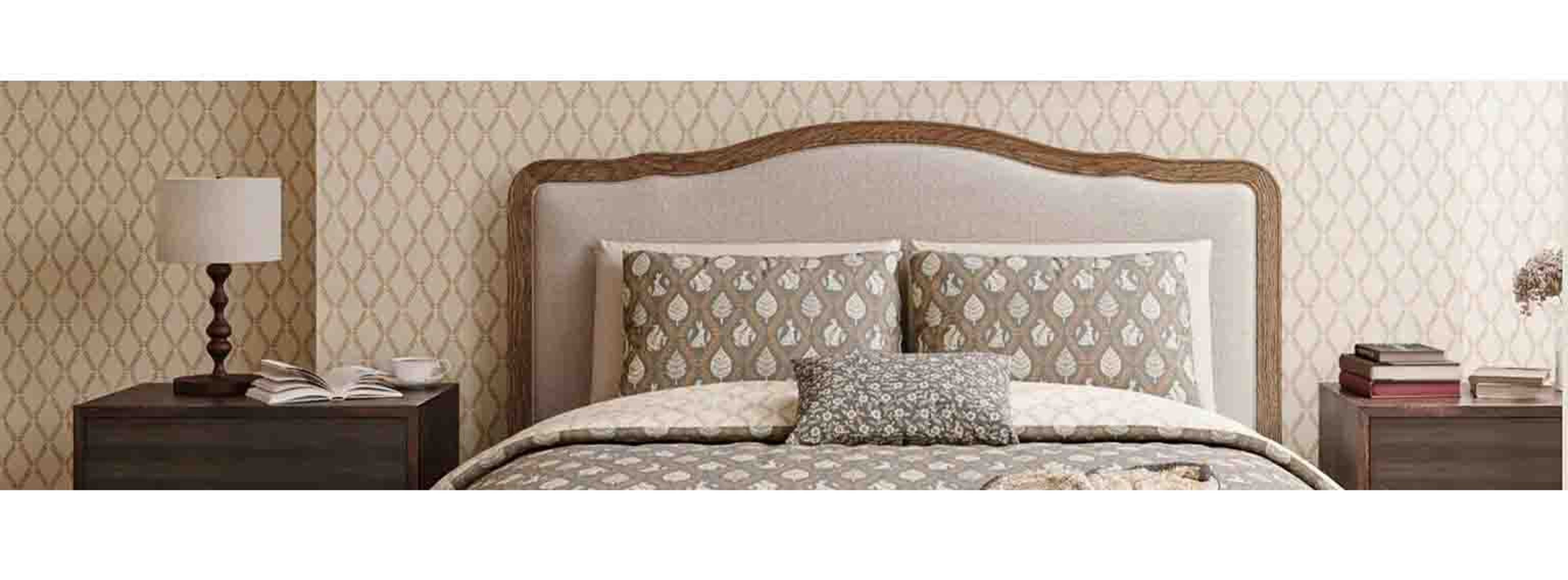 picture of a double bed with bedding