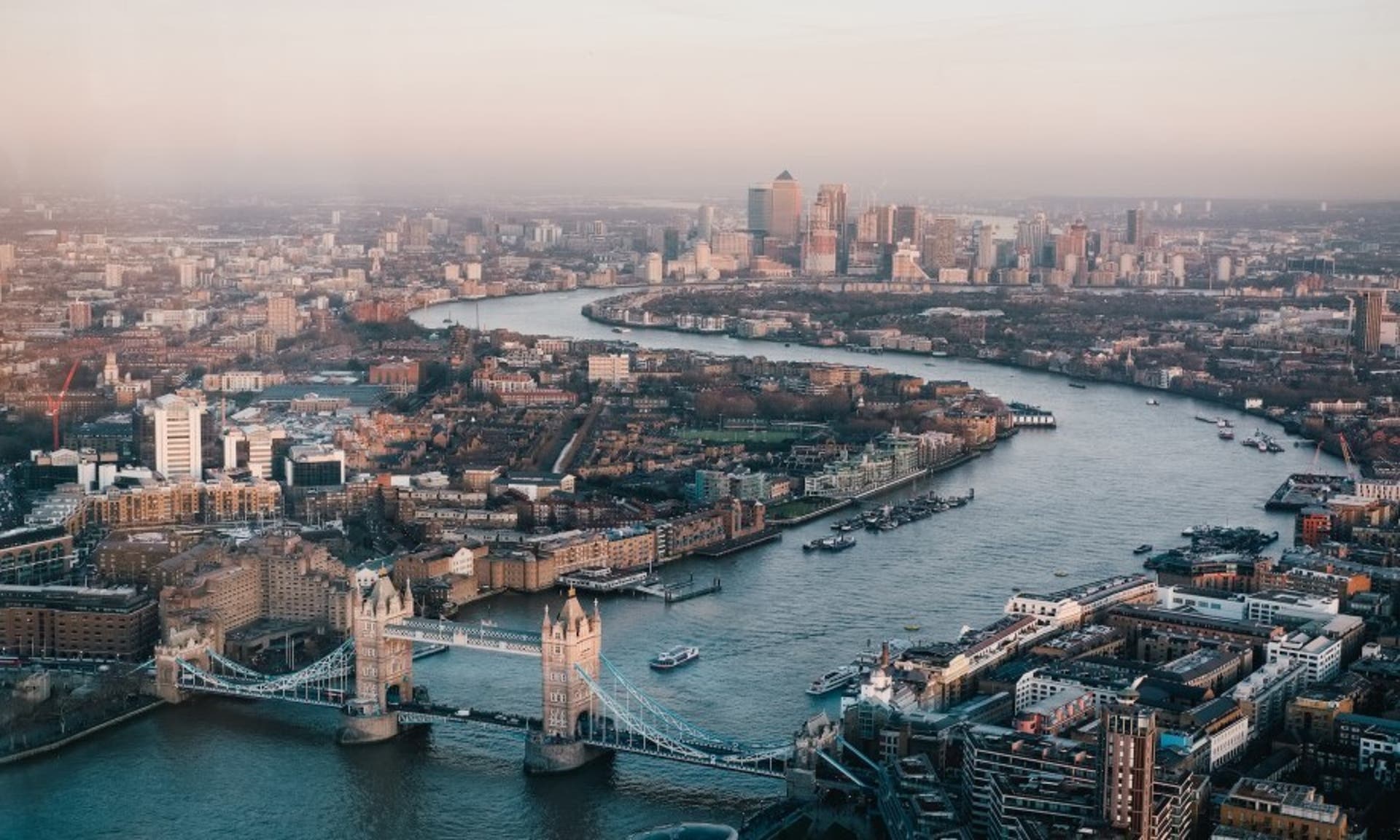  Aerial shot of the London skyline, including Tower Bridge 