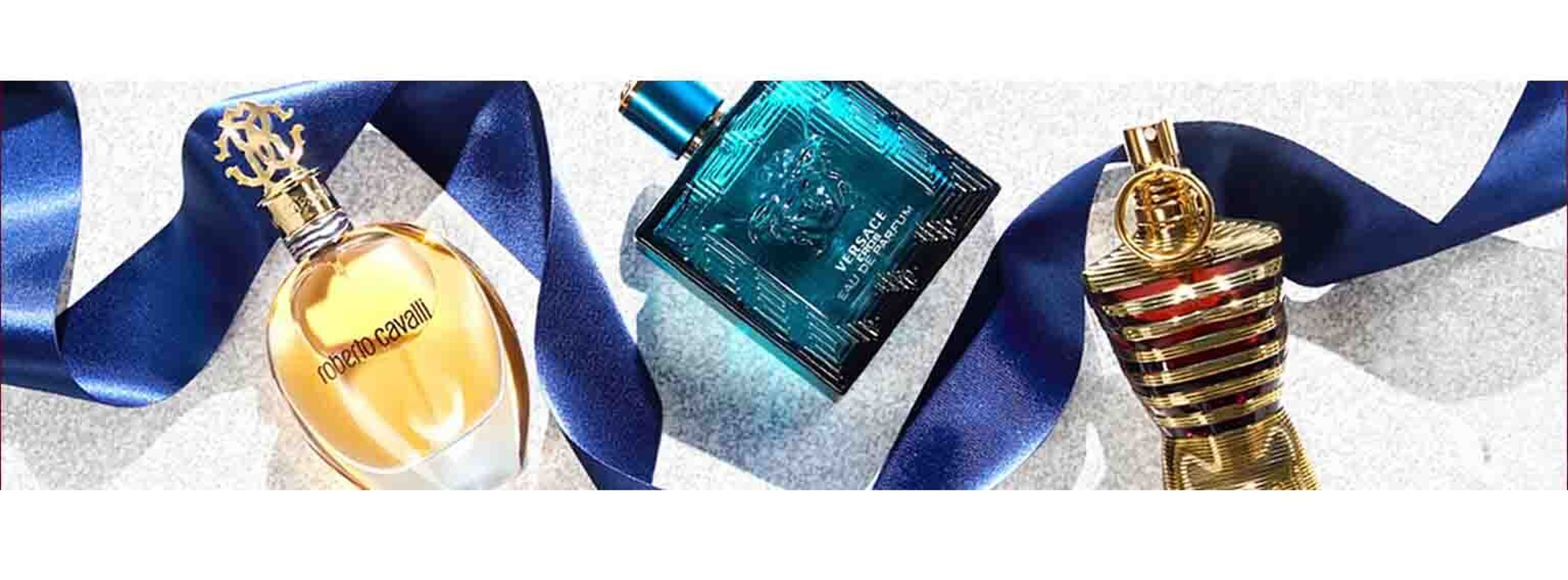 versace perfume with blue ribbon and two other perfume products