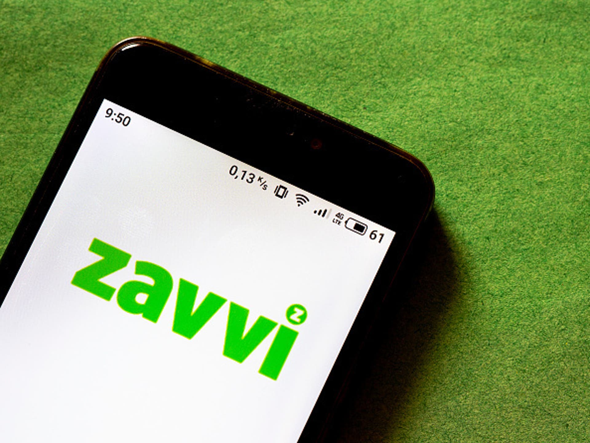  photo illustration of a Zavvi logo seen displayed on a smartphone 