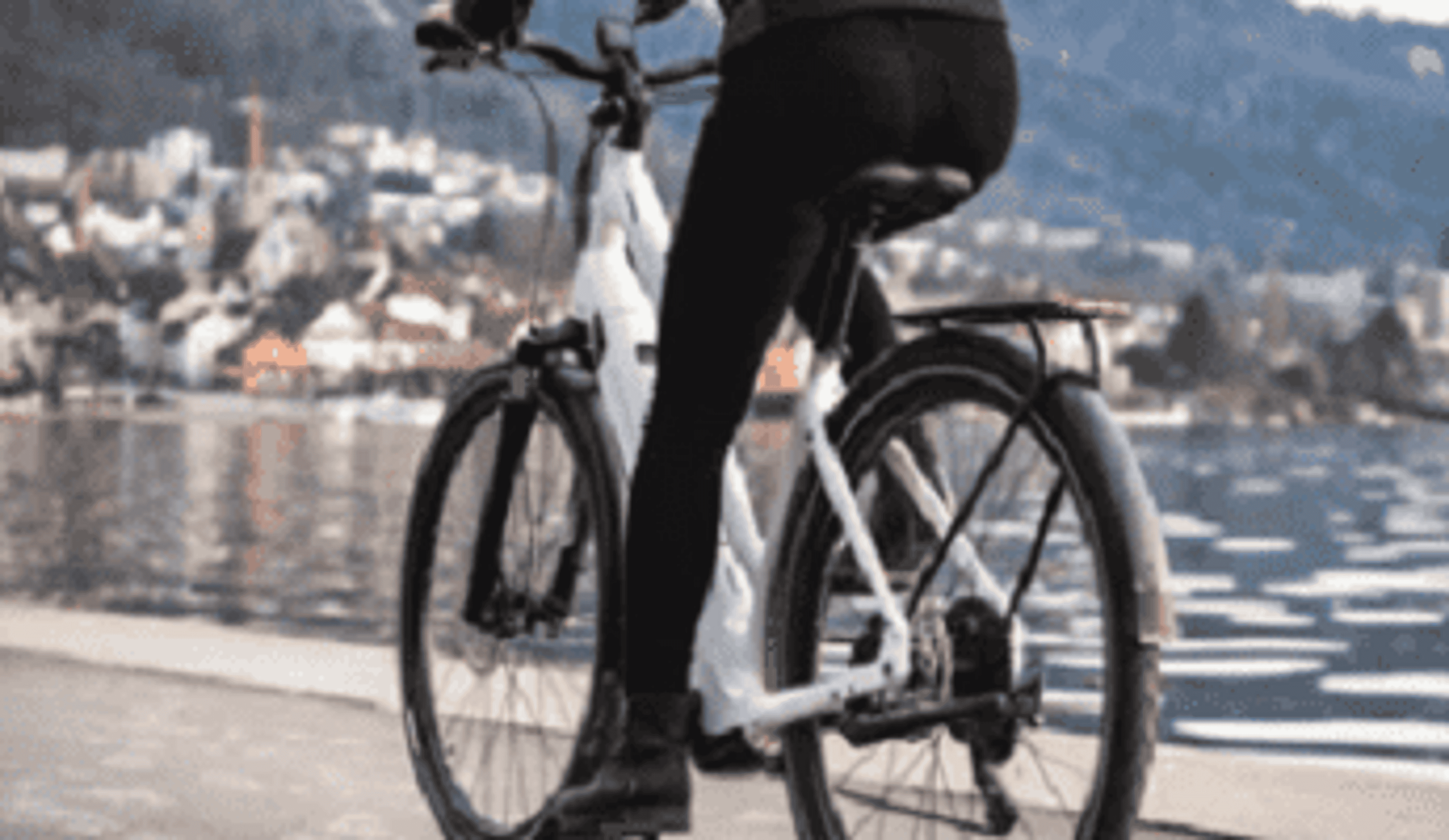  Riding a Pure Electric e-Bike along the water front. 