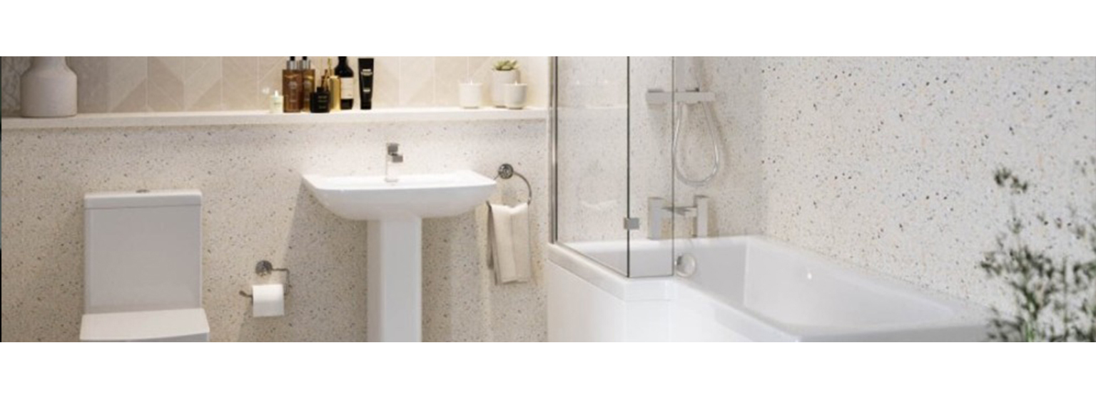  Picture of a White Bathroom highlighting the remodel showcasing the sink, the bathtub and shower, as well as some green plants accents 