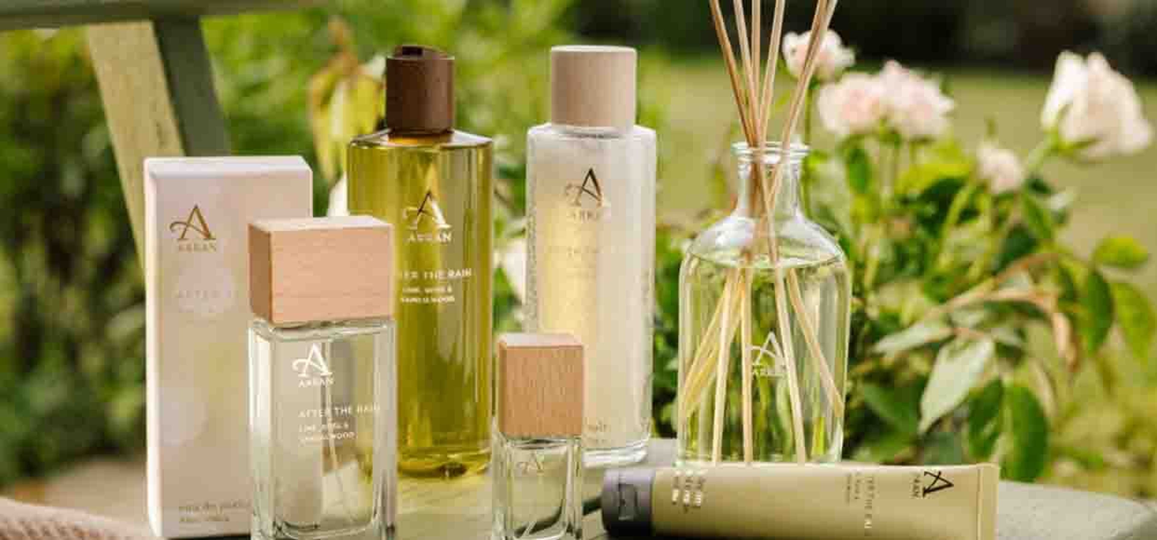 a collection of perfumes and smellies in the garden