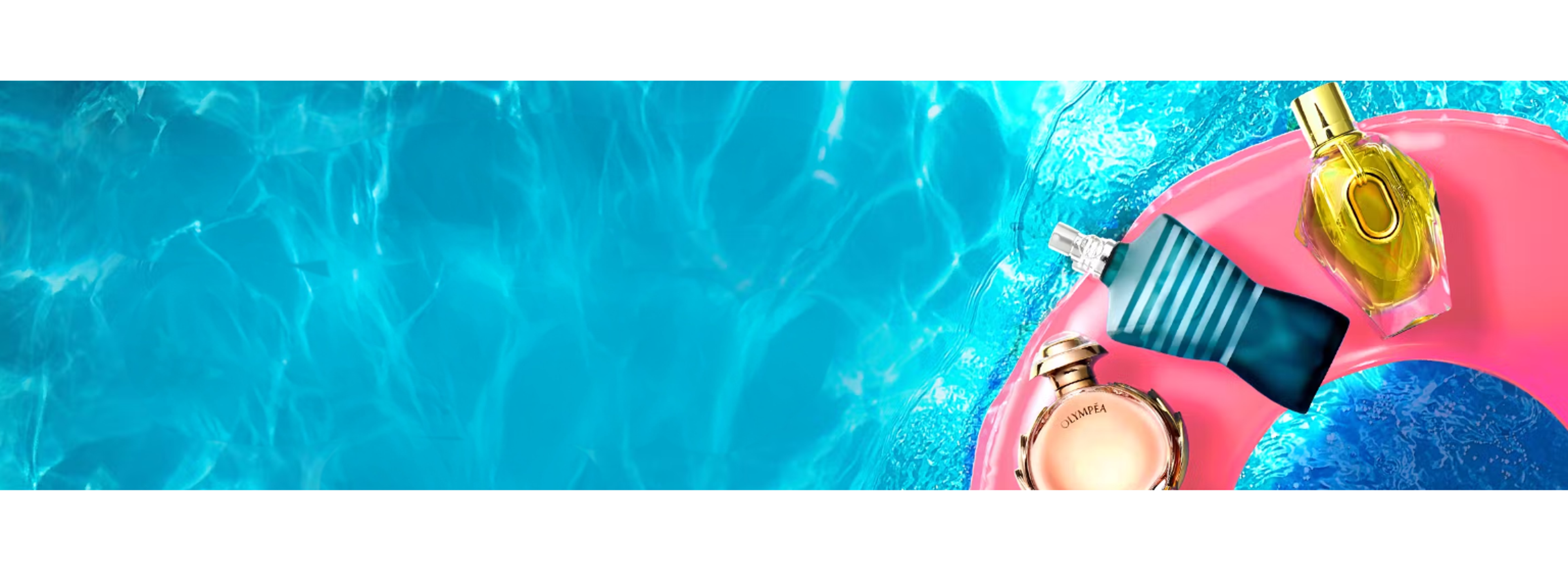 pool with pink rubber ring and fragrances ontop