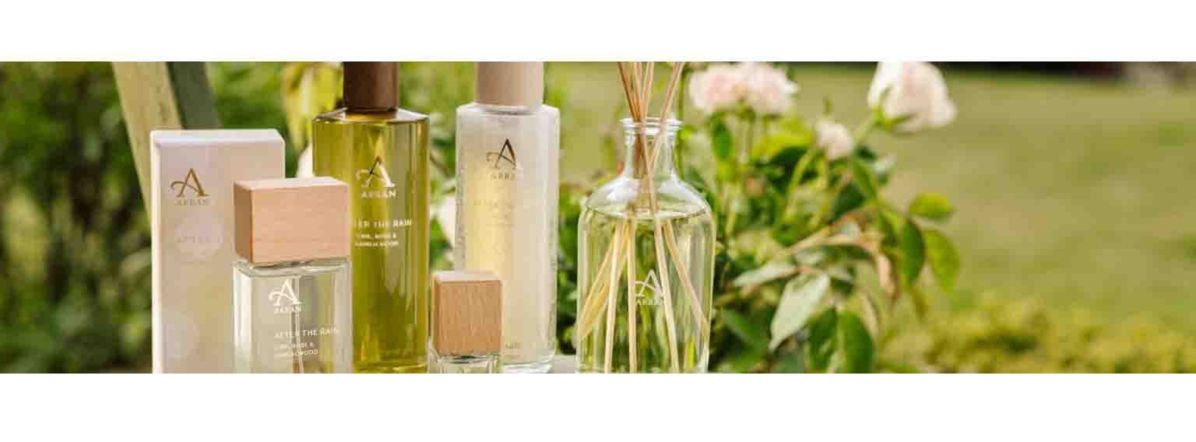 a collection of perfumes and smellies in the garden