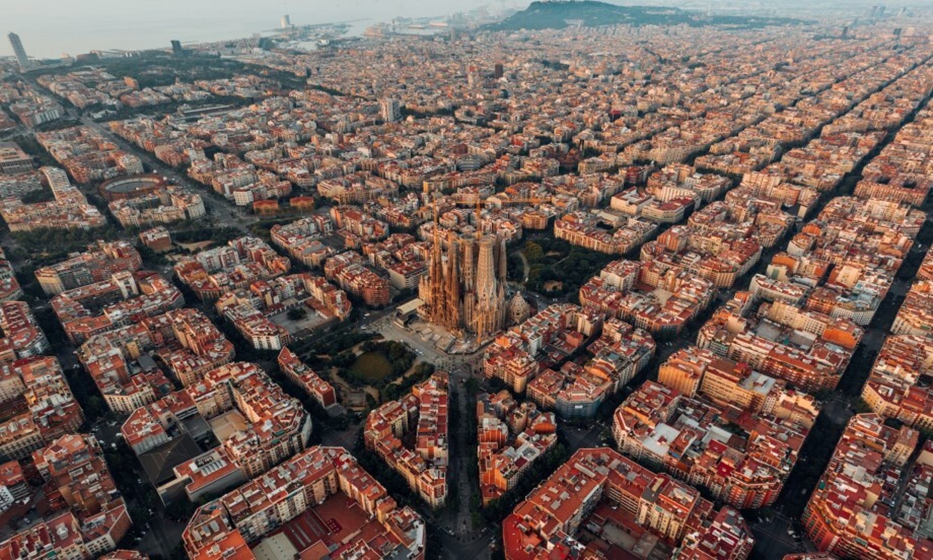  A birds eye image of the city of Barcelona, with the Sagrada Familia at the centre 