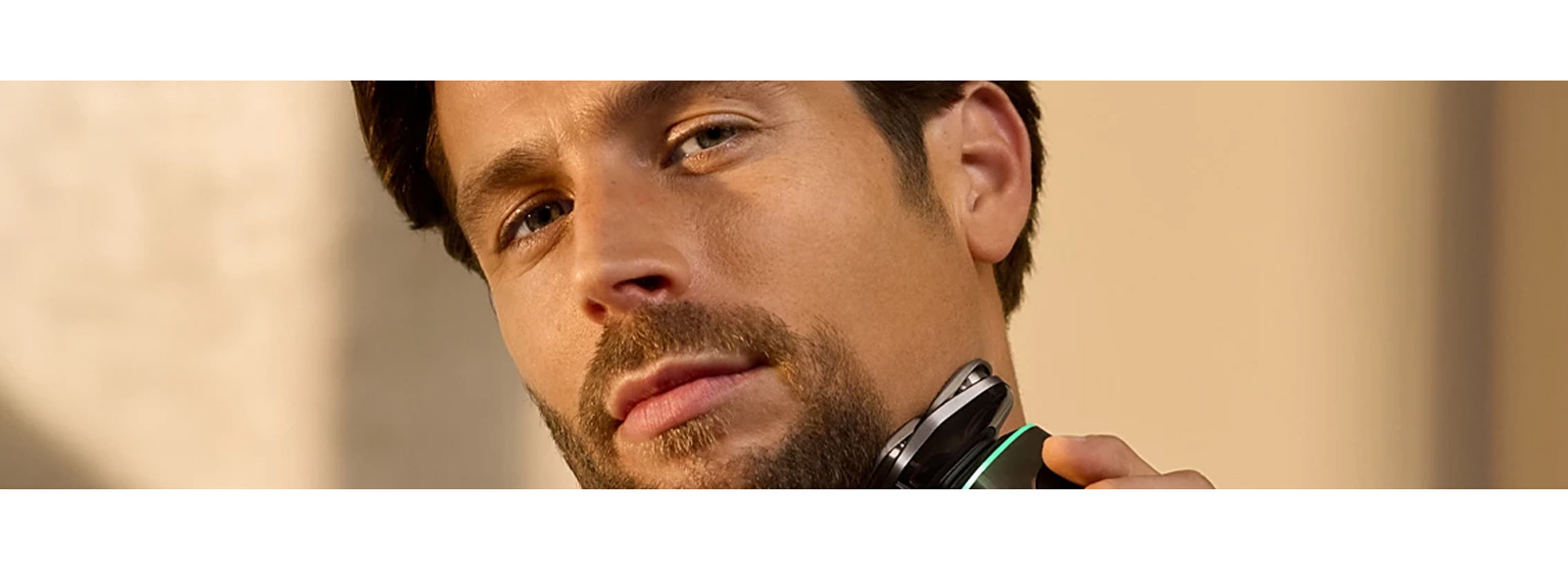 man shaving his face