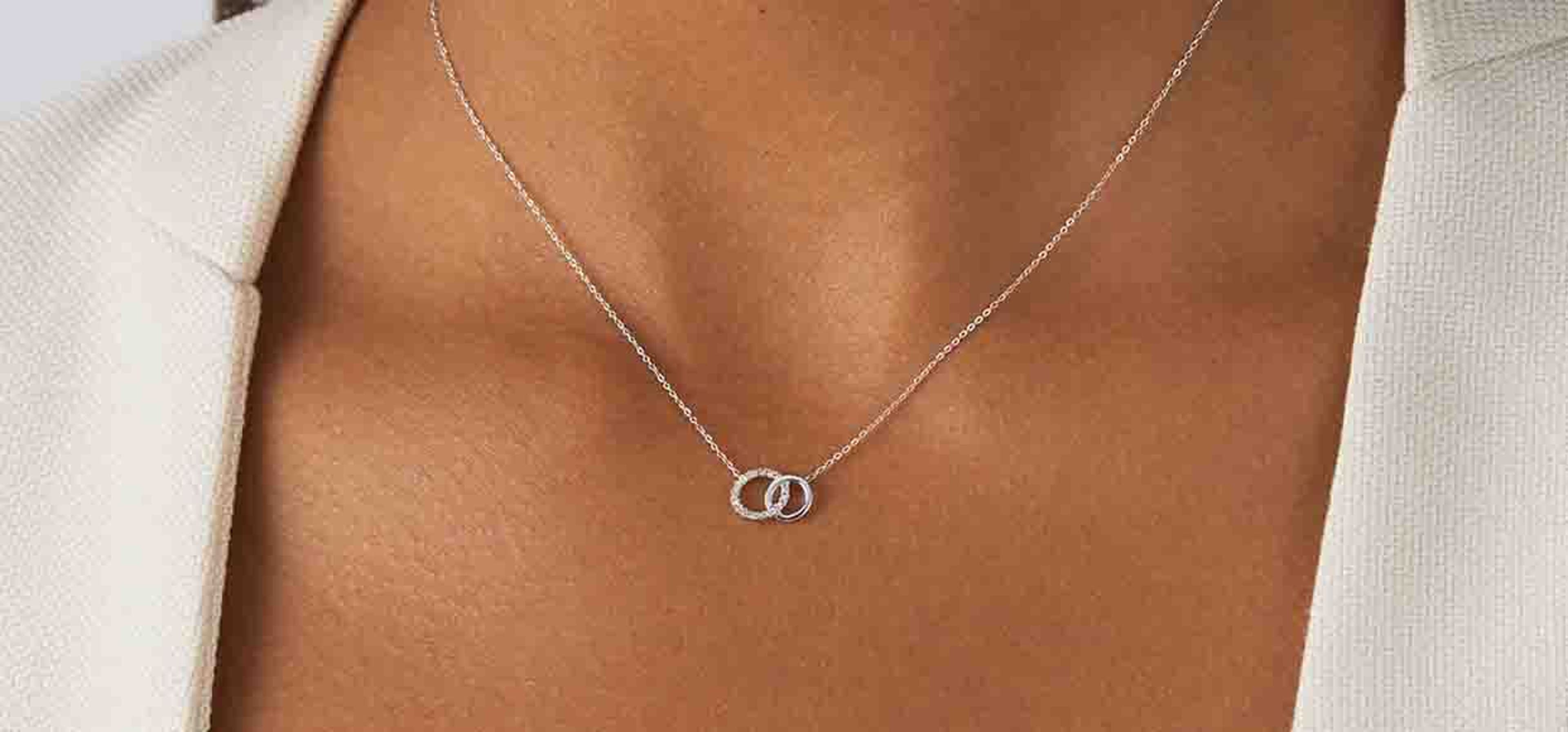 image of a woman wearing a delicate bracelet