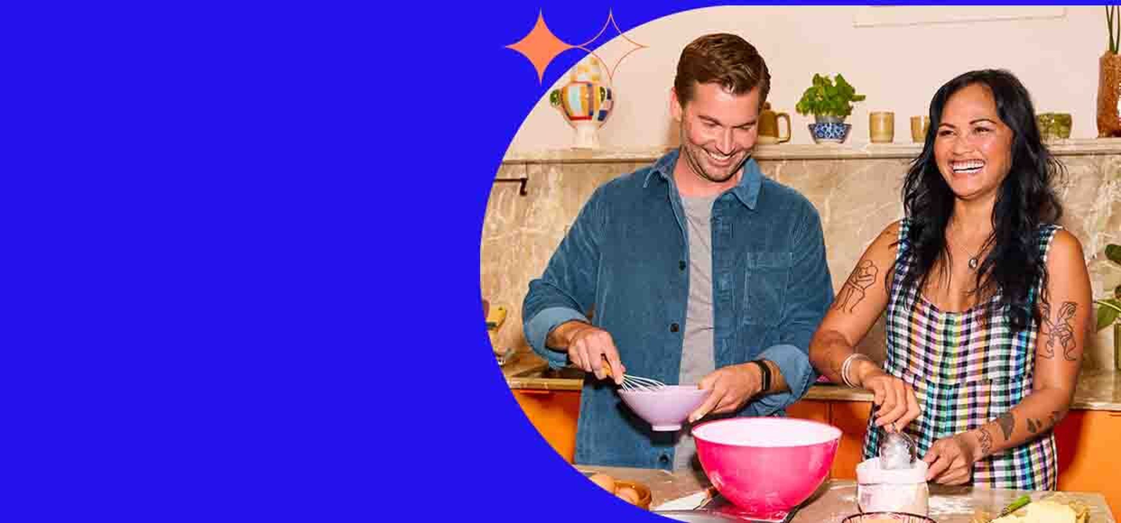 two people mixing in the kitchen