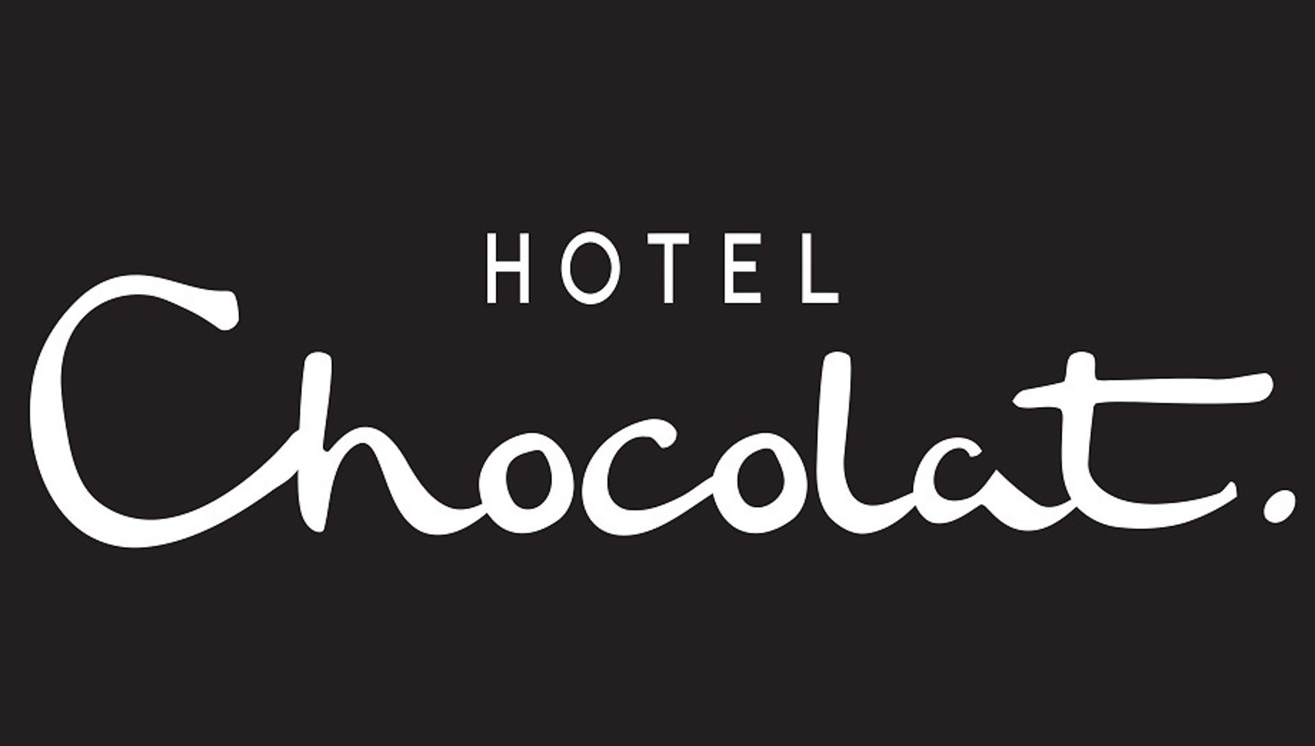  The Hotel Chocolat logo in white text on a black background. 